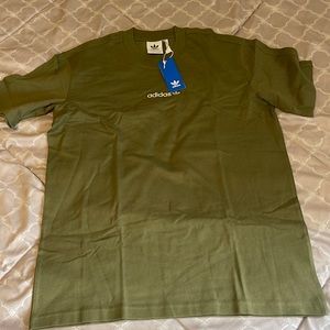 Mens green adidas original t shirt . Will fit womens small- medium